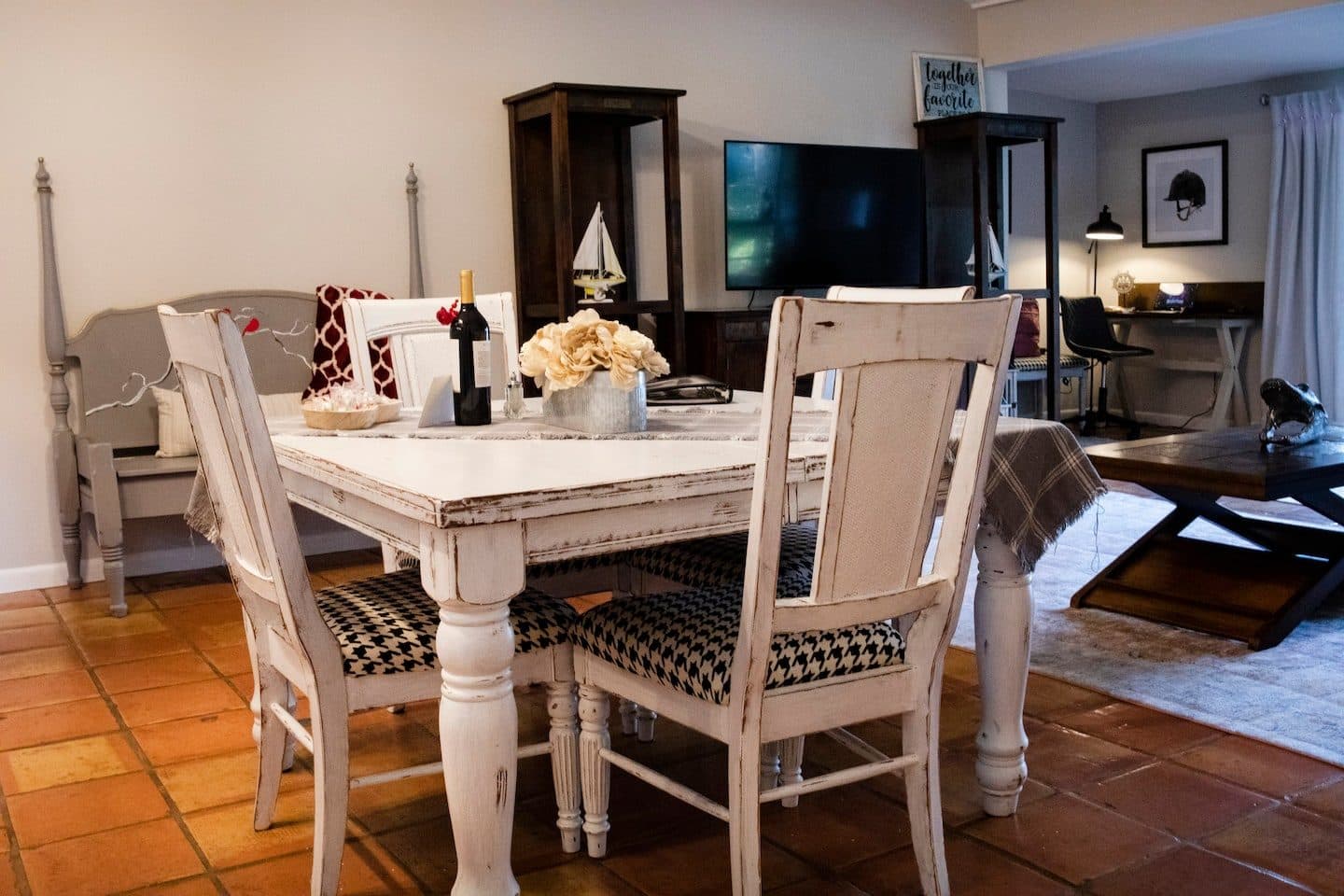 Dining table for four next to the living area